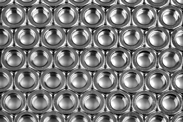 abstract metal background with nuts