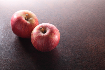 apples in brown background