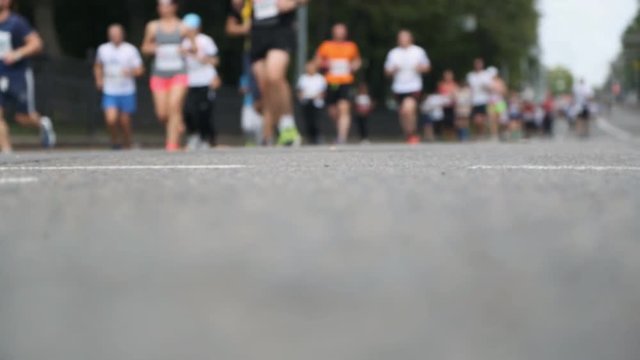 Group of people running in a marathon