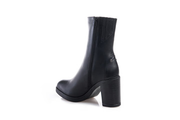 Black suede boot isolated on white background.