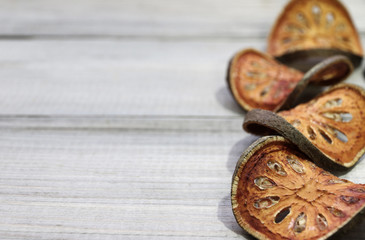 Dry Bael fruit on table with space for your text.