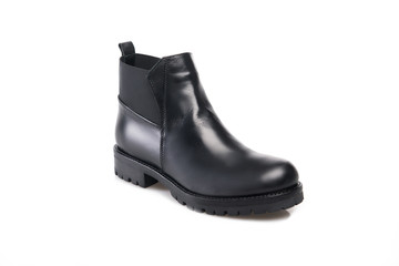 Black suede boot isolated on white background.