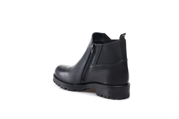 Black suede boot isolated on white background.