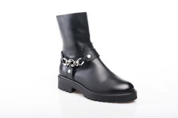 Black suede boot isolated on white background.