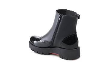 Black suede boot isolated on white background.