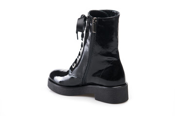 Black suede boot isolated on white background.