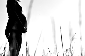 Black and white pregnant woman