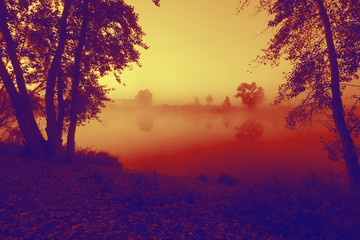 Naklejka na ściany i meble dawn.fog over the river