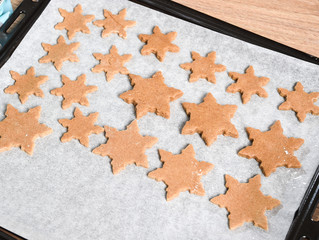 Texture of freshly baked homemade gingerbread start cookies.
