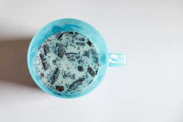 Pile of brownies with milk