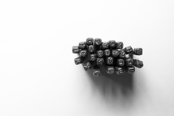 Metal alphabet on white background