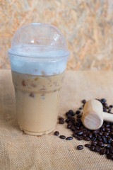 Ice milk coffee sweet drink with coffee bean