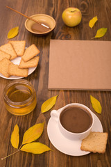 Autumn composition with coffee and leaves