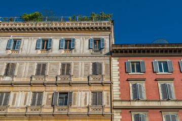 Fototapeta na wymiar Low angle view of old buildings in historical centre of Rome a s