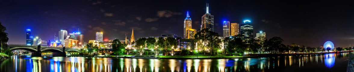A beautiful view of Melbourne downtown across the Yarra river at night in Melbourne, Victoria,...