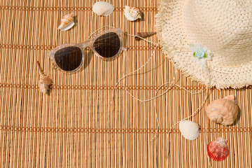 Top view of beach summer accessories with copy space. Lay flat beach accessories