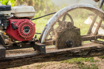 Man cutting wood with a innovation machine.