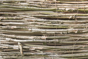 Braided wooden fence background