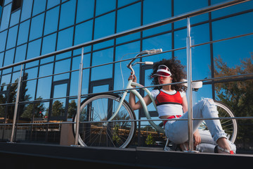 stylish woman with bicycle