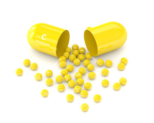 3d render of vitamin C pill with granules