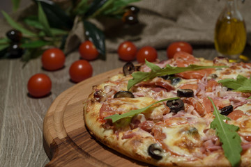 Delicious fresh pizza served on wooden table