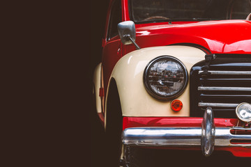 Vintage cars on a black background.
