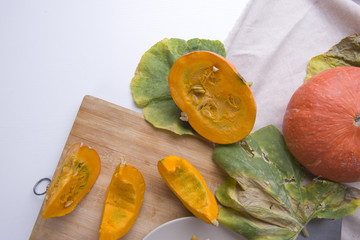 Pumpkin slices on the table. 
