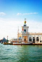 Fototapeta na wymiar Dogana, old custom house in Venice, Italy, retro toned