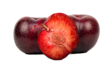 Red plum with half