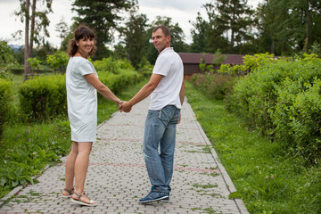 Couple in love walking in park