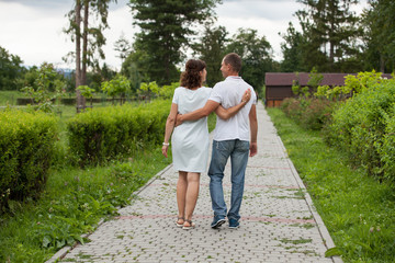 Fototapeta premium Couple in love walking in park