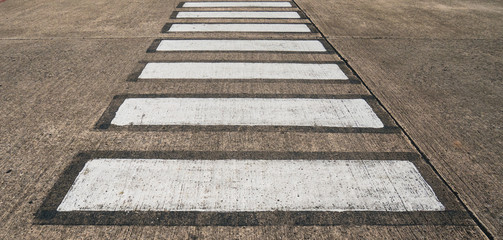 Crosswalk on the road is a symbol for crossing the road.