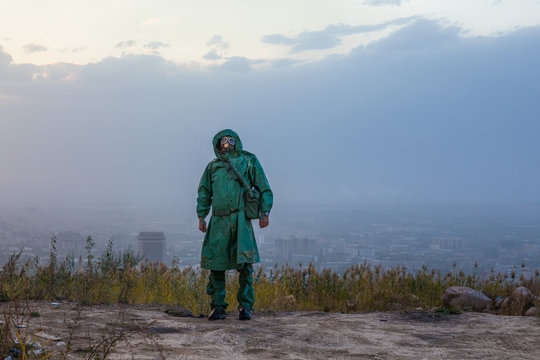 stalker,man in a gas mask in a polluted city