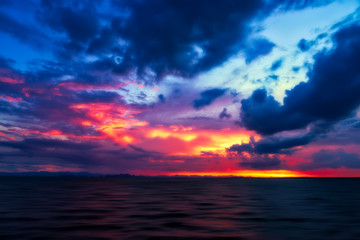 Full color cloud of twilight sky at the lake.