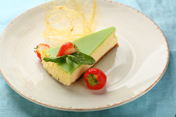One cheesecake piece with strawberries