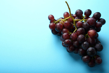 Blue food background with grape