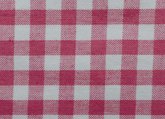 Material for a tea towel or table cloth with a checkered red and white pattern