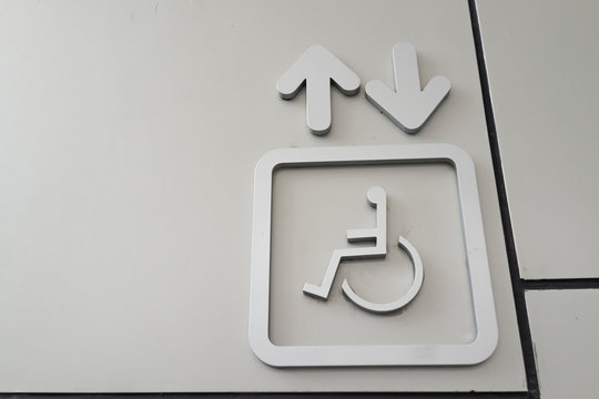 The sign of elevator for disabled handicap wheel chair people