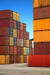 Colorful containers in a blue sky