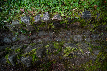 Ancient stone drainage with grass on top