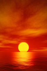 Fototapeta premium duży piękny czerwony zachód słońca nad oceanem