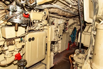 Interior of combat submarine compartment with devices of control.