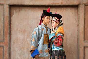 Fototapeta na wymiar Mongolian couple in a traditional costume.