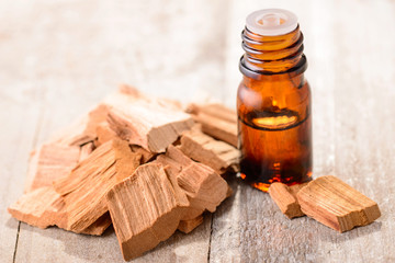 Sandalwood essential oil on the table