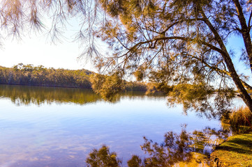 Obraz premium The Lake and the reflections of the Light on the Water.