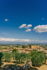 Naklejka premium View on Tuscany landscape over the roofs of old town