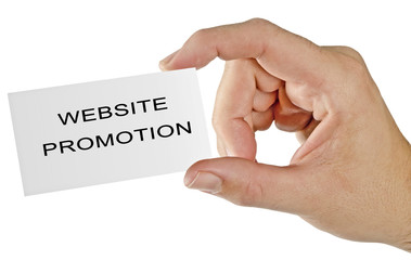 Card with written WebSite Promotion in hand