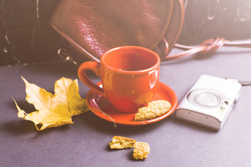 Bag, coffee, camera, autumn leaves