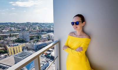 woman with phone and backpack in the city 10