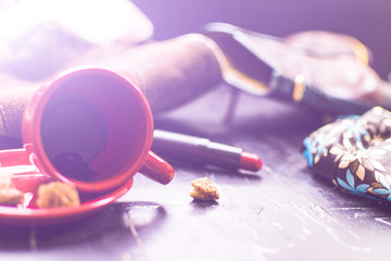 Women's clothing and coffee on the floor. Morning hangover.